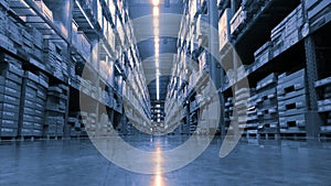 Huge product warehouse with tall shelves and lots of boxes stack over each other and bright led lights from top ceiling.