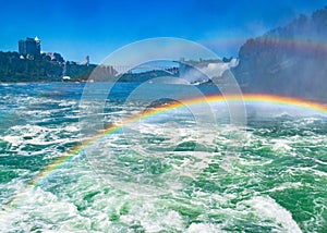 Huge rainbow and view on Bridal Veil Falls, Niagara Falls, part of Goat Island, Ontario, Canada. High quality photo