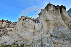 Huge rock as decayed granite with featured pattern photo