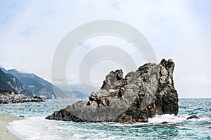 Huge rock at Monterosso beach, Cinque Terre, Liguria, Italy