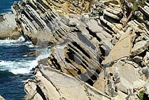 Typical rough cliffs on Portugals west coast photo