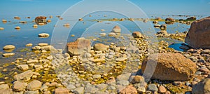 Huge rocks on the Gulf of Finland beach. Saint Petersburg, Russia