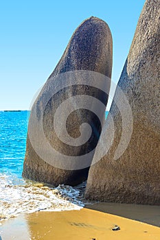 Huge rocks on the shore of the South China Sea in the World's End park. Sanya, China