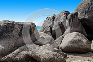 Huge rocks on the shore of the South China Sea in the World's End park. Sanya, China