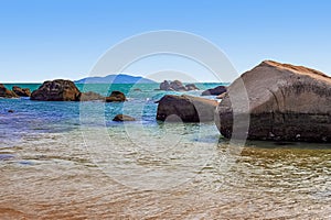 Huge rocks on the shore of the South China Sea in the World's End park. Sanya, China