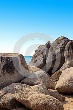 Huge rocks on the shore of the South China Sea in the World's End park. Sanya, China