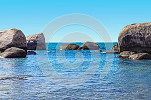 Huge rocks on the shore of the South China Sea in the World's End park. Sanya, China