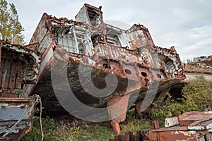 Huge rusty pieces of decommissioned marine ship.