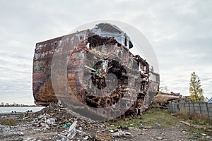 Huge rusty pieces of decommissioned marine ship.