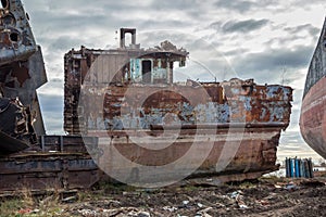 Huge rusty pieces of decommissioned marine ship.