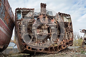Huge rusty pieces of decommissioned marine ship.
