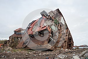 Huge rusty pieces of decommissioned marine ship.