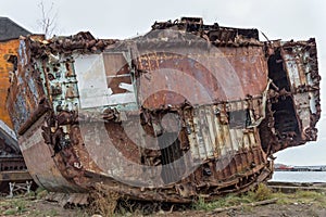 Huge rusty pieces of decommissioned marine ship