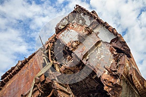 Huge rusty pieces of decommissioned marine ship