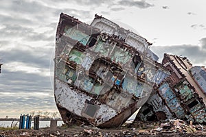 Huge rusty pieces of decommissioned marine ship