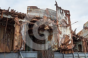 Huge rusty pieces of decommissioned marine ship