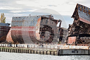 Huge rusty pieces of decommissioned marine ship