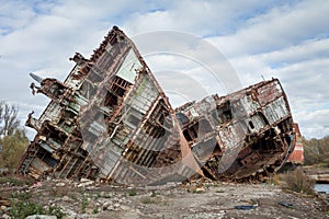 Huge rusty pieces of decommissioned marine ship