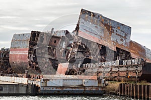 Huge rusty pieces of decommissioned marine ship