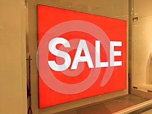 Huge sale sign in clothing shop
