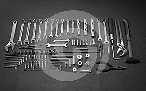 Huge set of universal mechanics hand tools laid out in order