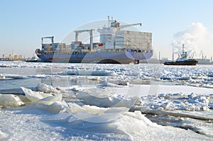 A huge ship with cargo.