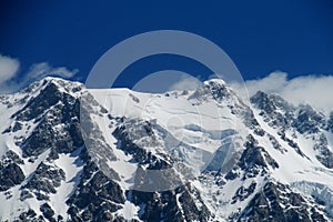 Huge snow and rocky mountain