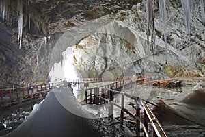 Huge stalagmite in the Great Hall of the Scarisoara cave, Romania.