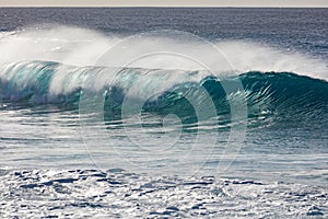 Huge surfing waves against ocean water background