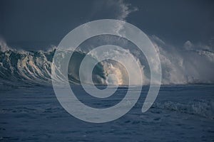 Huge surfing waves in ocean water during storm