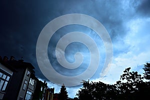 Huge thundercloud darkens the sky