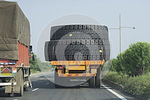 Huge Tyres  Loaded on another truck on Indian Road