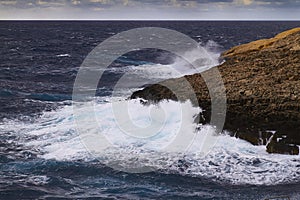 Huge waves crash on cloudy day. Kemmuna island