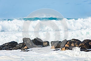 Huge waves crashing on rocks