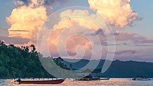 Huge White Clouds above Diving Station on Sunset, Homestay Gam Island, West Papuan, Raja Ampat, Indonesia