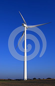 Huge wind-turbine on blue.