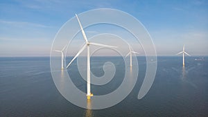 Huge windmill turbines, Offshore Windmill farm in the ocean Westermeerwind park , windmills isolated at sea on a