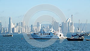 Huge yacht and Several boats anchored in Panama Bay