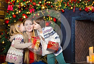 Hugging mother and daughters