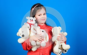 Hugging teddy bear. little girl playing game in playroom. toys for kid. small girl with soft bear toy. happy childhood