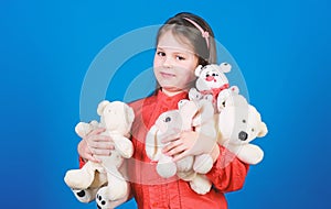 Hugging teddy bear. little girl playing game in playroom. toys for kid. small girl with soft bear toy. happy childhood