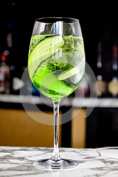 Hugo Elderflower Cocktail with green liqueur and cucumber