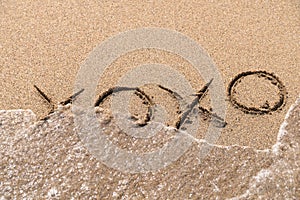 Hugs And Kisses XOXO Sign On Sand photo