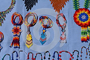 Huichol handicraft pieces, inhabit the north of Jalisco and part of Nayarit, Zacatecas and Durango Mexico. photo