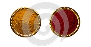 Huldi kumkum in a golden cup isolated on white background, turmeric and kumkum for Indian traditional pooja and functions