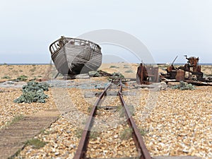 The hull of an abandoned fishing boat on Dungeness beach