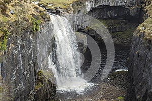 Hull Pot lies on the western side of Pen-y-ghent in the Yorkshire Dales