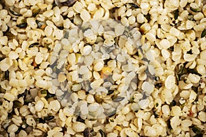 Hulled hemp seeds background, texture. Superfood