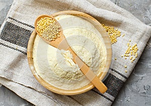 Hulled millet flour and grain in a bowl