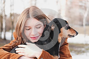 Human being happy with a dog.